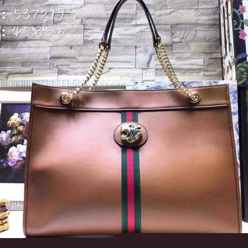 G*u*i shopping bags